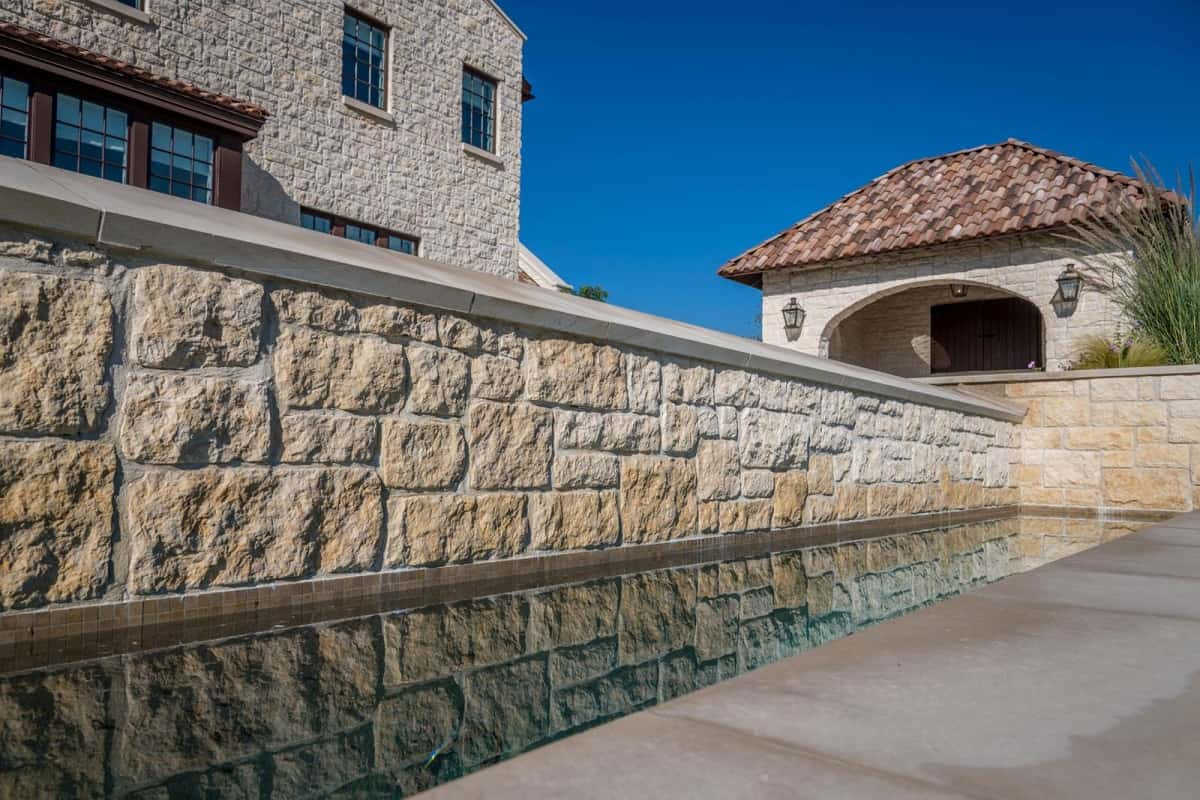 Stone Wall Installation by Venado Landscaping